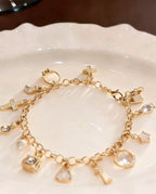 Pulseira Com Pingente Feminina Banhada A Prata 925 E Ouro